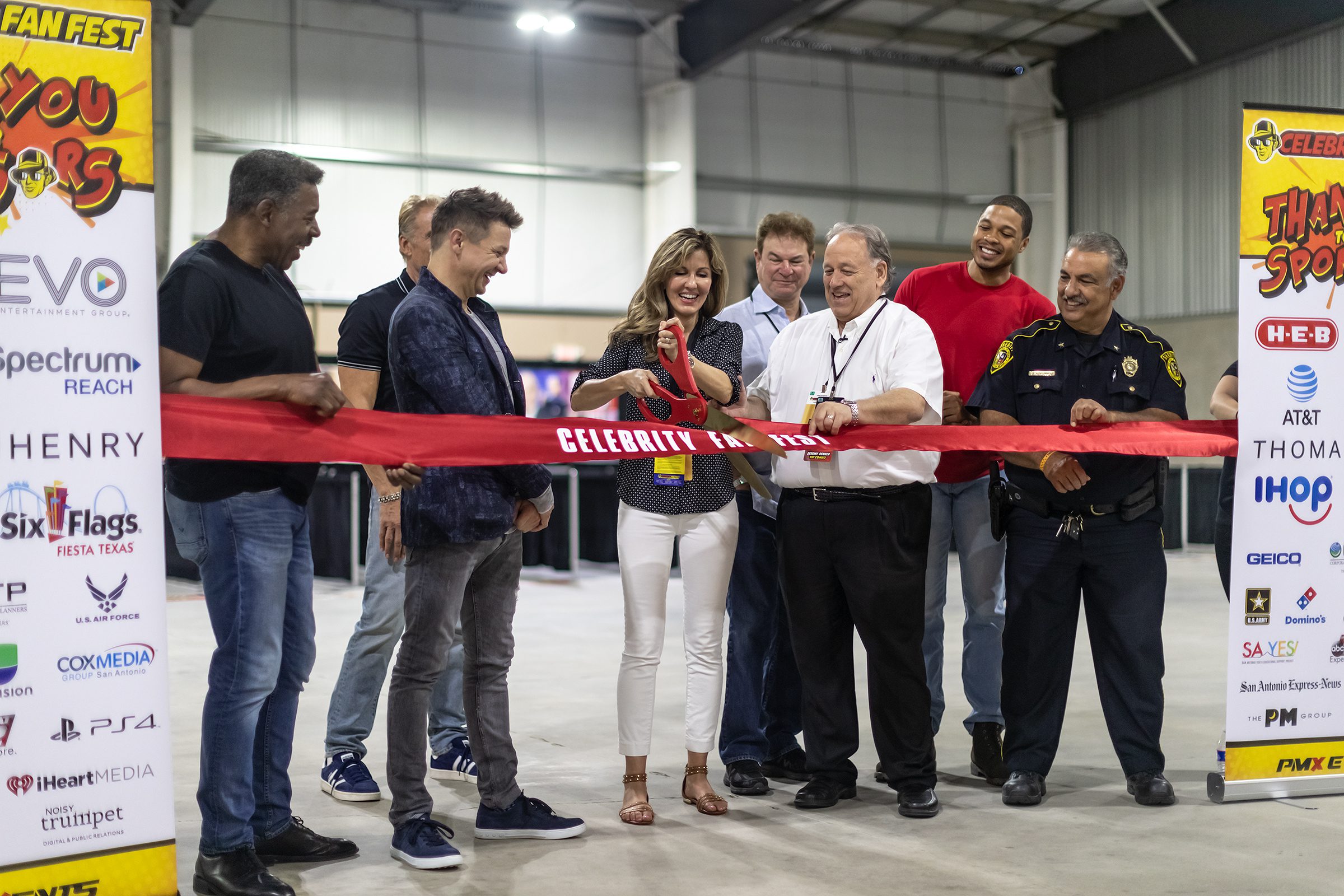 Peggy Wills cutting the Celebrity Fan Fest ribbon